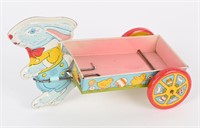 CHEIN TIN DRESSED EASTER BUNNY PULLING CART