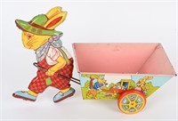 LARGE CHEIN TIN DRESSED EASTER BUNNY PULLING CART