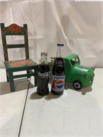 Odds and ends. Chair; truck; pop