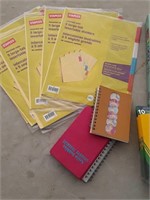 Assorted notebooks and school supplies