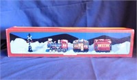 2 lighted ceramic railroad trains, one in box