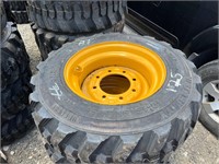 4 Unused 10-16.5 Skid Steer Tires on Wheels