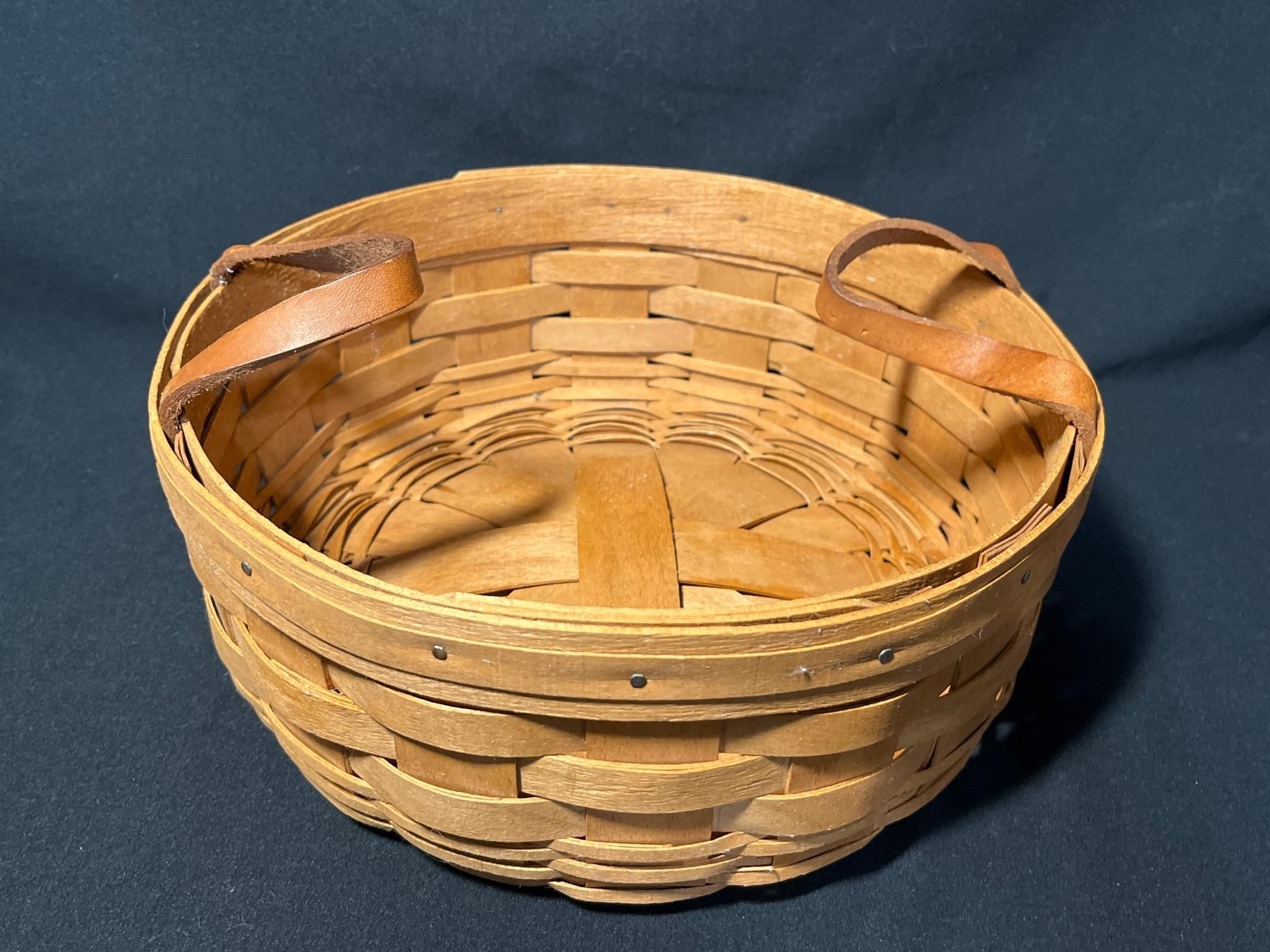 Longaberger basket with leather handles.