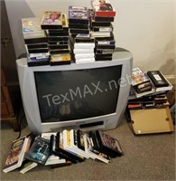 Various VHS Tapes and Panasonic 27in TV
