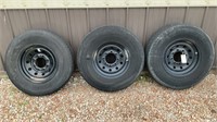 Set of three ST235/80R16 trailer wheels