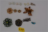 54K: (12) pins/costume jewelry