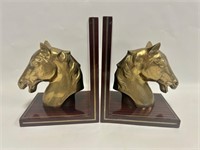 Brass horse head bookends.  Wood with brass. Nice!