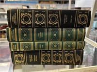 Four Gold Leather Bound Books