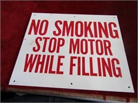 Plastic sign. NO Smoking Stop motor while filling.