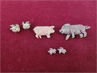 Pink rhinestone pig earrings. Brooches, pendants