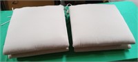 Set of 4 outdoor tan cushions. New 19 x 19
