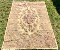 Rug - machine made, center medallion, worn on