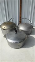 Three cast aluminum lidded pots