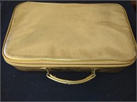 Sm gold suitcase
