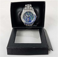 Womens Silver Tone Wristwatch W/ Peacock Face