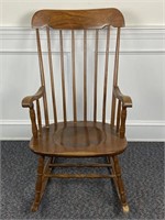 Vintage wooden rocking chair, has some wear