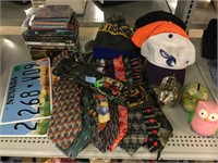 Assorted ties, hats, dvd movies, license plates