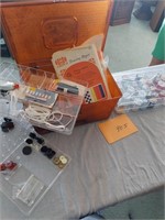 Plastic sewing box with sewing notions