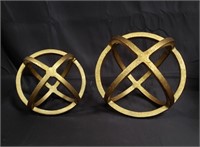 Pair of metal gold painted orbs