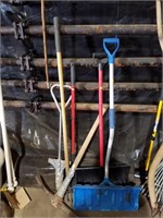 Gardening tools in snow shovels