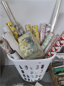 laundry basket of gift wrap
