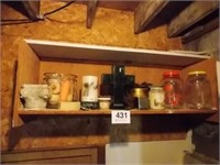 Wall shelf: glass cross - tea jars - candles