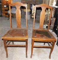 2 vintage oak dining chairs w/ leather seats,