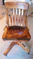 Antique oak swivel office chair on casters