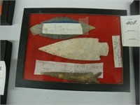 Lot of cased arrowheads.