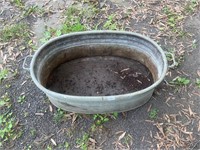 Galvanized tub- few small holes in bottom