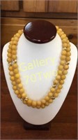Yellow jade beaded necklace with 14k yellow gold