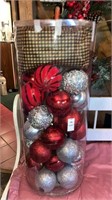 Tall tub of oversize ornaments