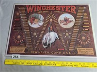 Winchester Metal Sign over Board