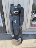 Wood carved bear statue