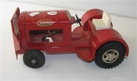 Vintage metal Tonka tractor. Measures 9" long.