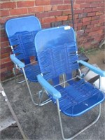 2 blue plastic chairs