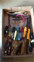 Tray of screwdrivers, pliers, prybars