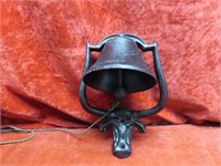 Cast iron steer dinner bell.