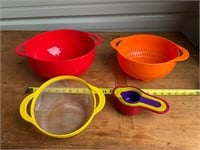 New Plastic bowls and measuring spoons/cups