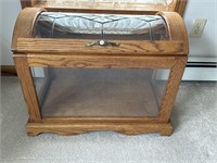 Hip trunk style wood display cabinet