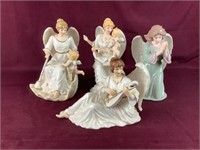 4 Porcelain Angels Including 2 With Cherubs,