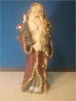 Very heavy Father Christmas with bag of toys