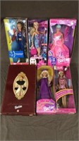 6 Barbie dolls