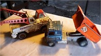 Dump truck and tow truck