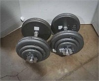 Pair of dumbbells, each has four 10 lb weights,