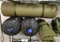 GROUP OF SLEEPING BAGS, ROLLS, MISC