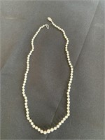 Strand of Pearls Marked 10K on the Clasp 21" Long