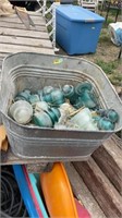 Wash tub with vintage insulators only.