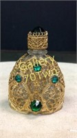 Antique gilded glass perfume bottle with green