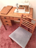 VINTAGE SINGER SEWING MACHINE WITH CABINET & CHAIR